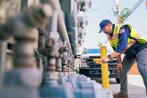 LBUD staff member checking gas meters
