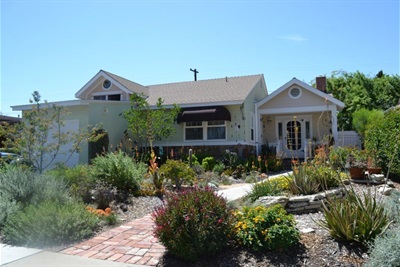 house with drought tolerant lawn